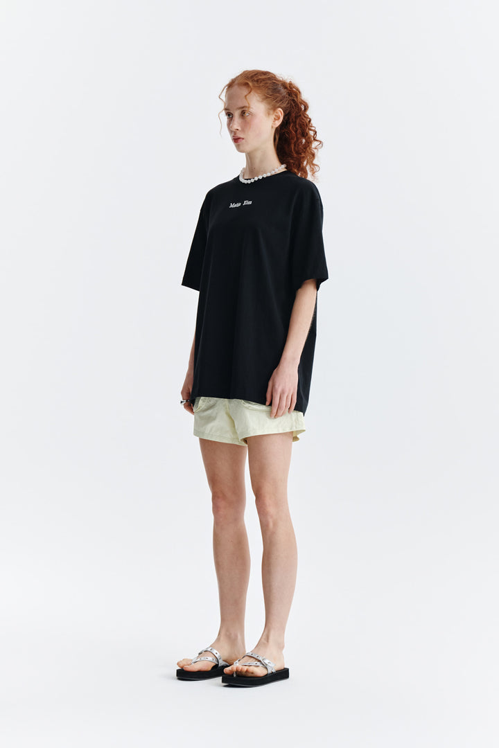 Matin Kim Embroidery Small Logo Oversize Top — Black