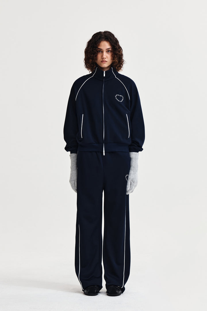 Matin Kim Heart Logo Track Pants — Navy blue