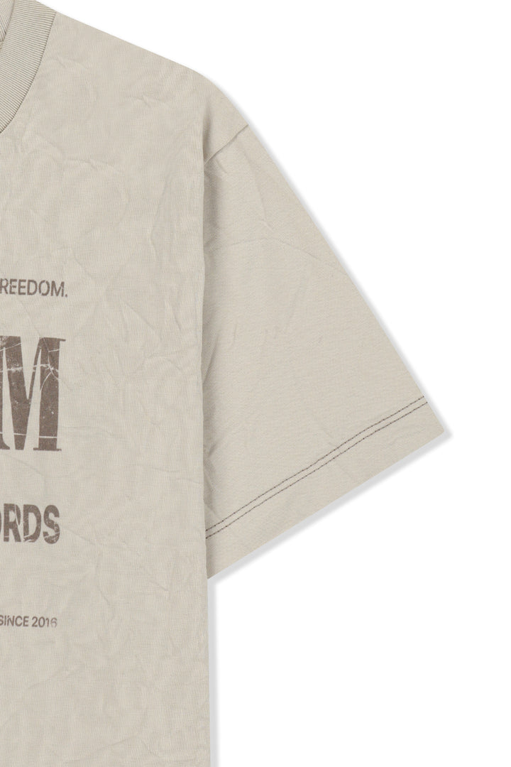 Matin Kim Lettering Graffiti Crease Top — Beige