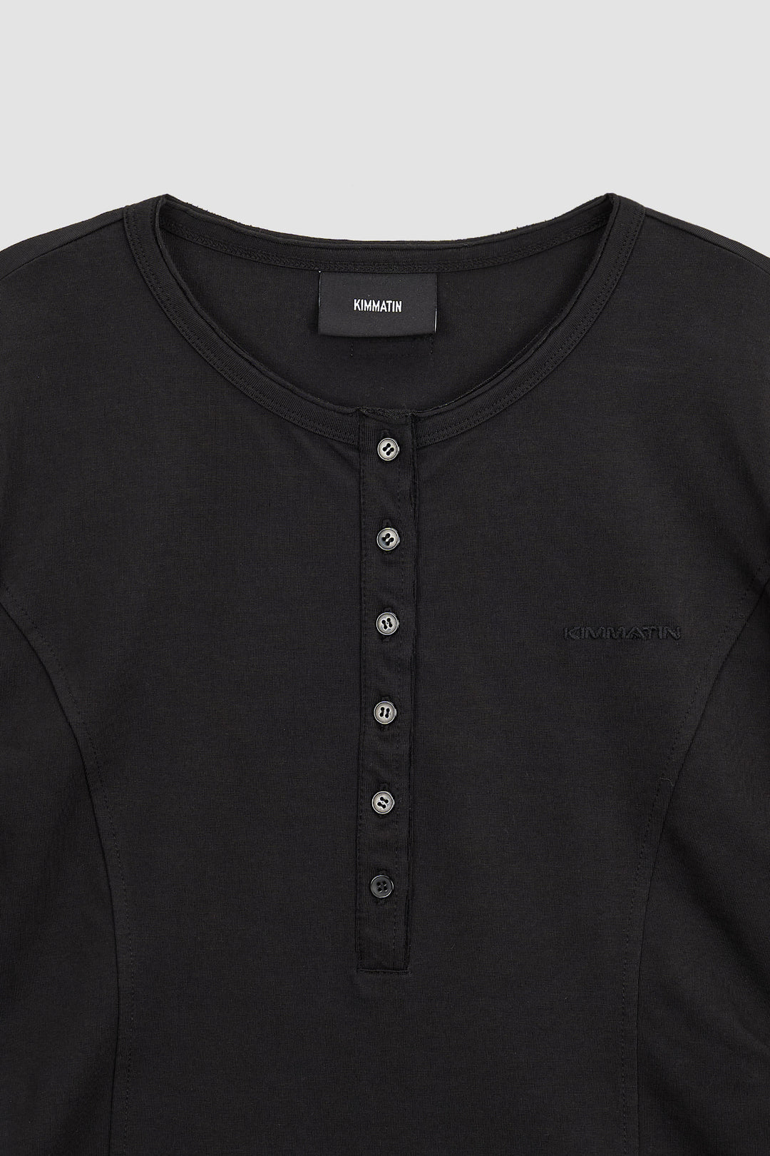 KIMMATIN Raw Cut Bodysuit Top — Black