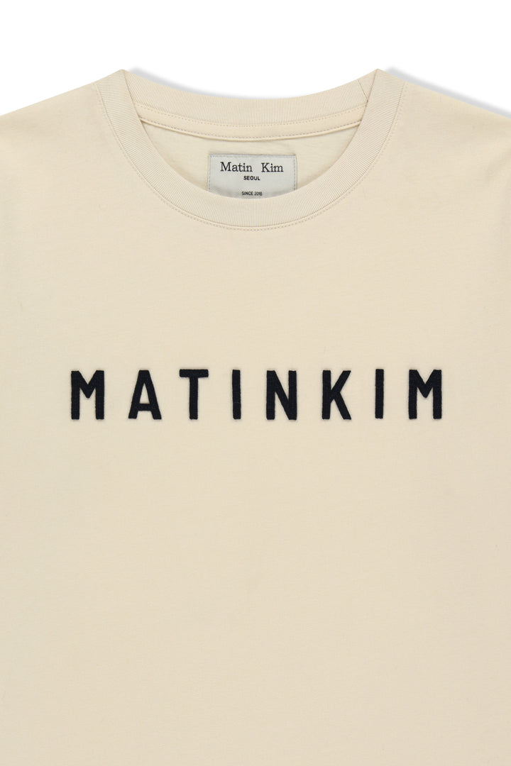 Matin Kim Applique Felt Logo Top — Cream