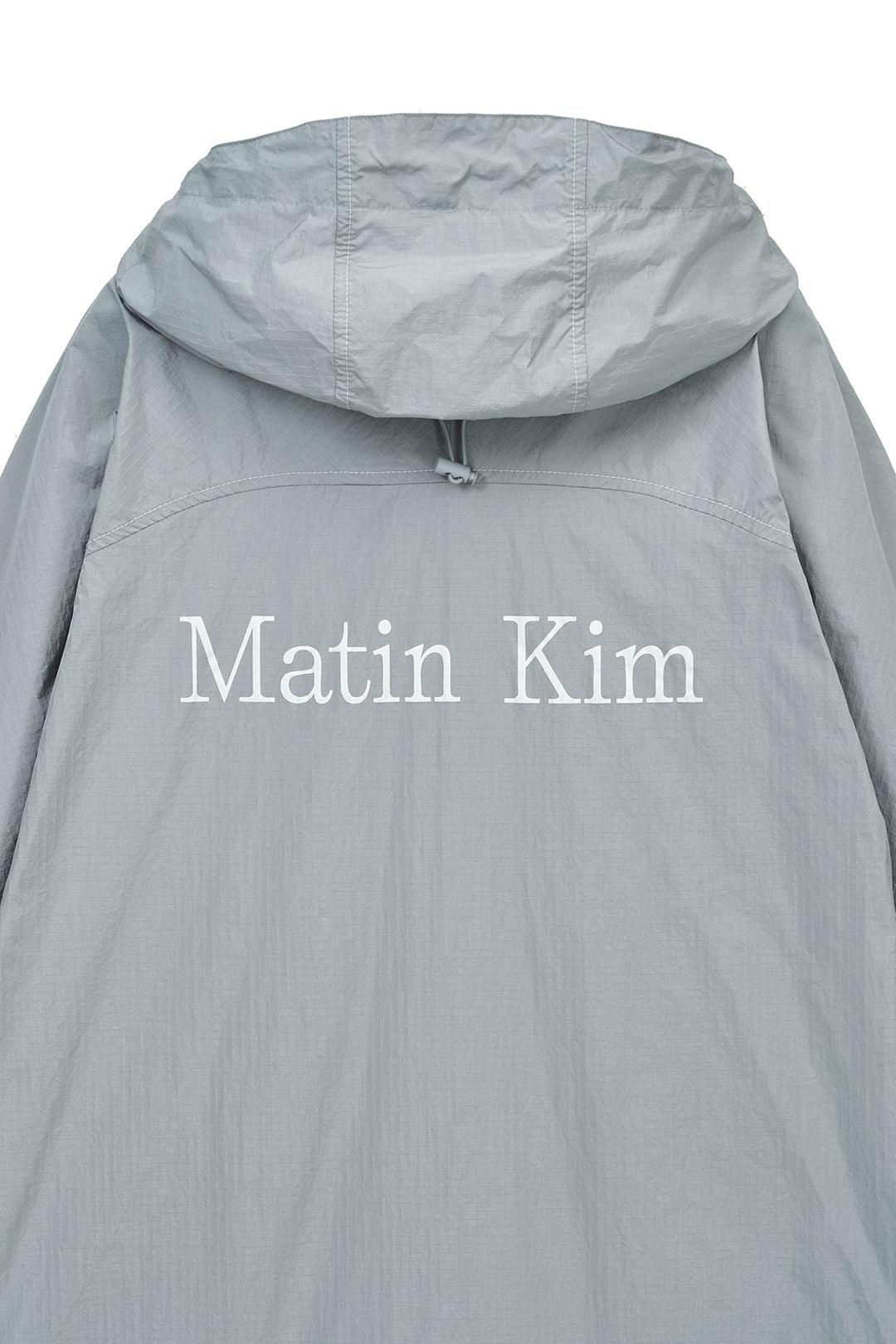 Matin Kim Back Logo Hoody Wind Breaker — Light Grey
