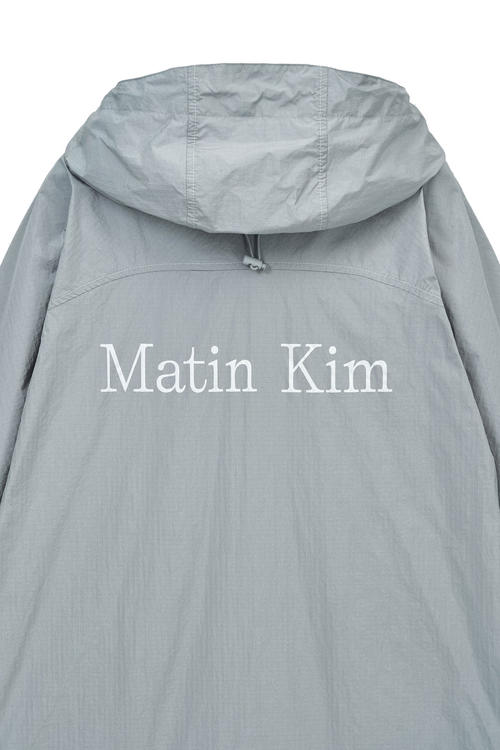 Matin Kim Back Logo Hoody Wind Breaker — Light Grey