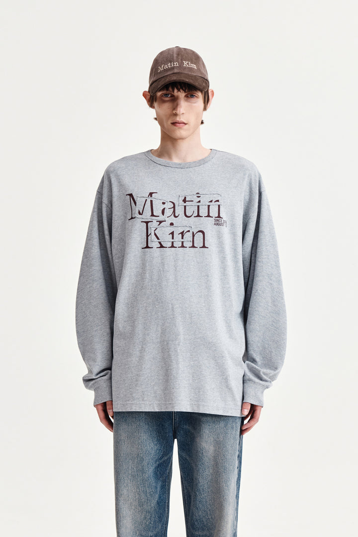 Matin Kim Patch Graphic Long Sleeve Top — Gray
