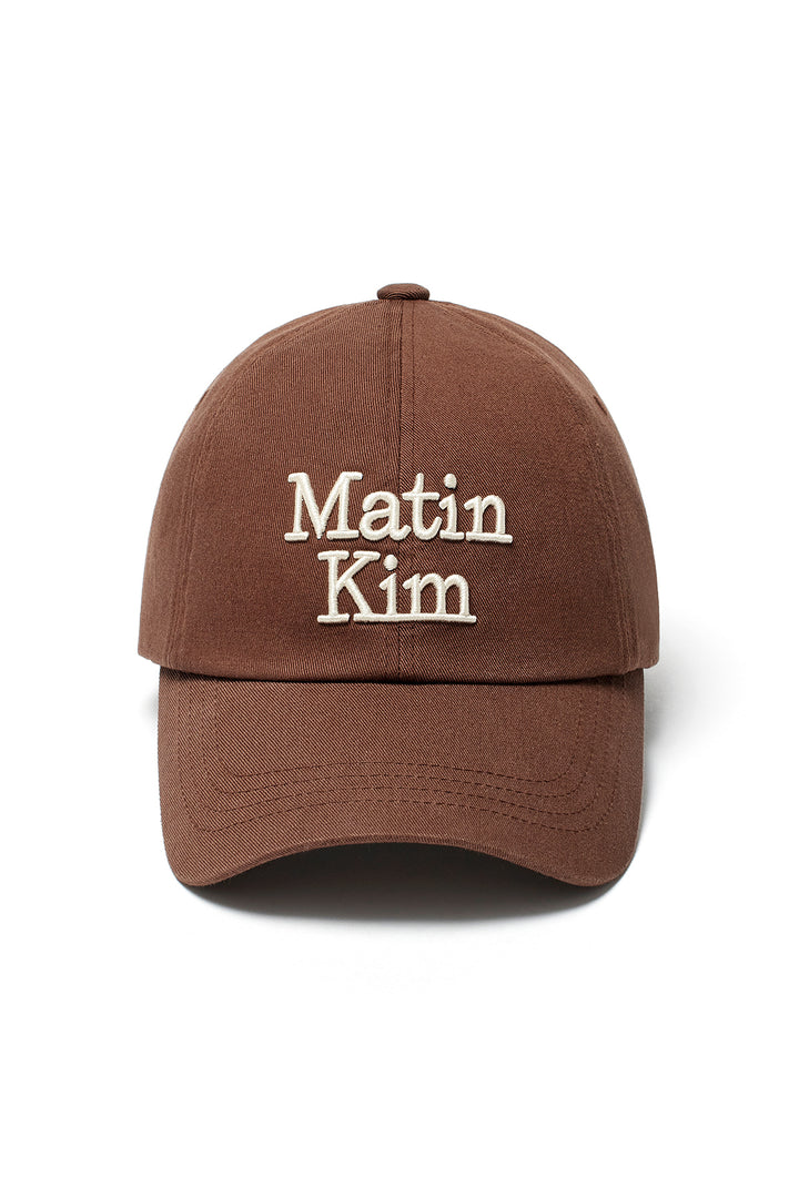 Matin Kim Volume Logo Ball Cap — Brown