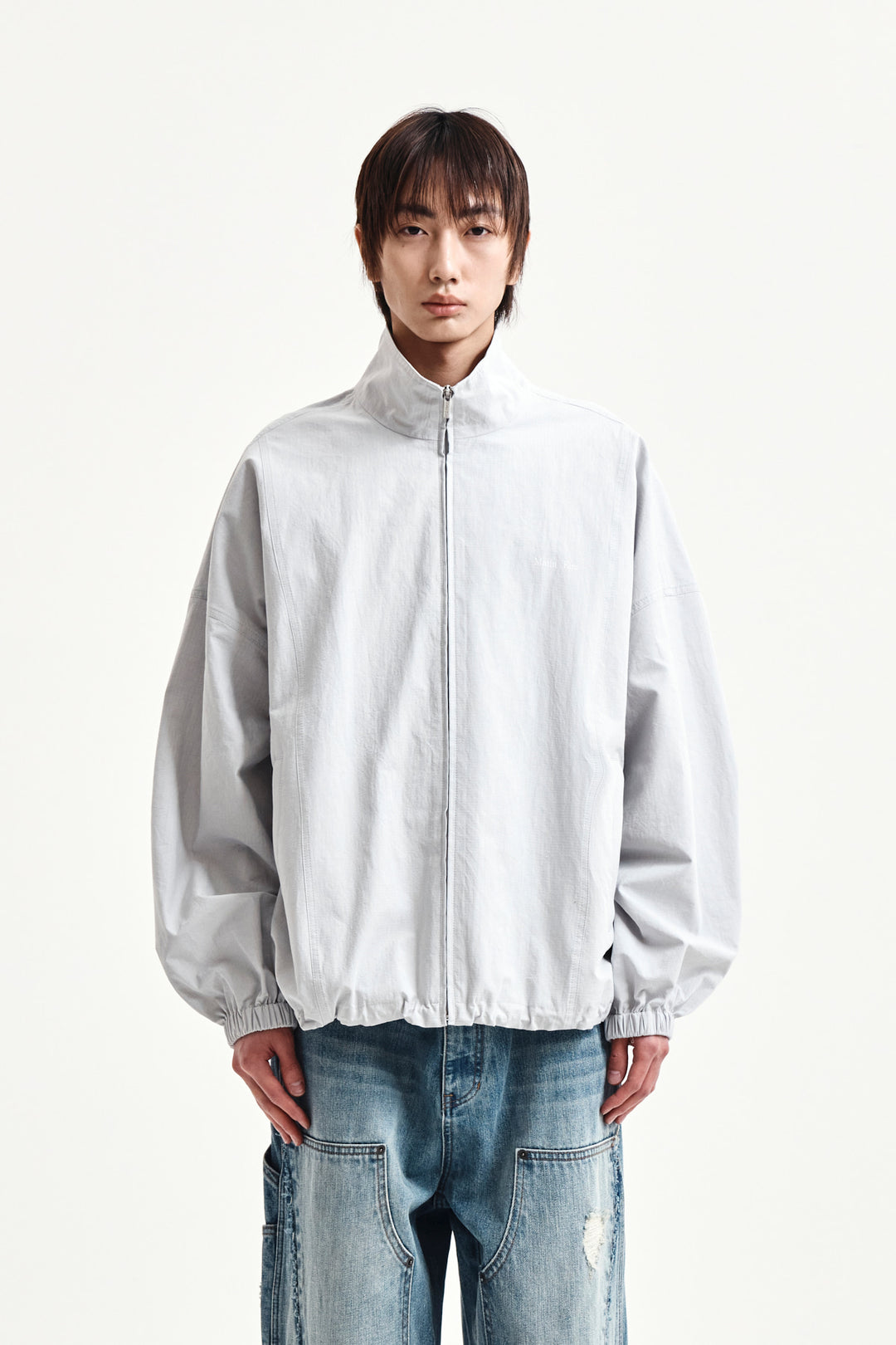 Matin Kim Back Logo High Neck Jumper — Light Grey