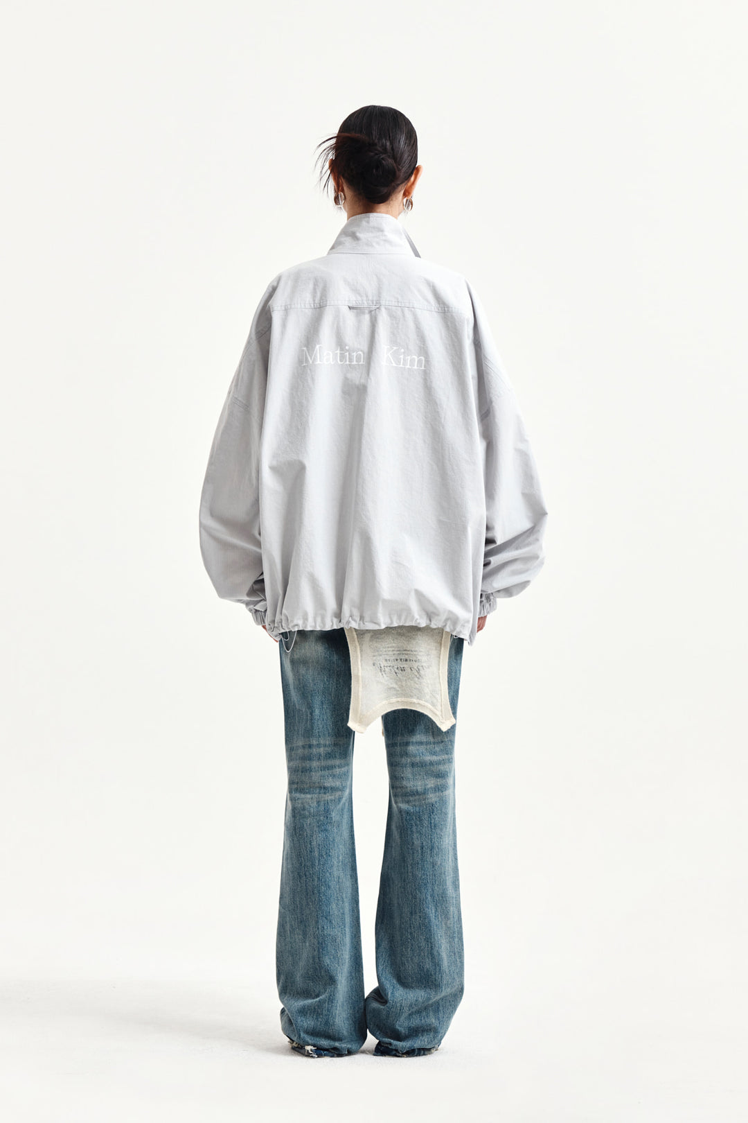 Matin Kim Back Logo High Neck Jumper — Light Grey