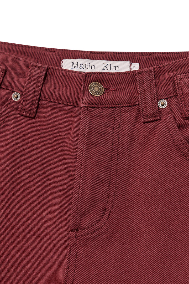Matin Kim Waist Buckle Curved Dying Denim — Red