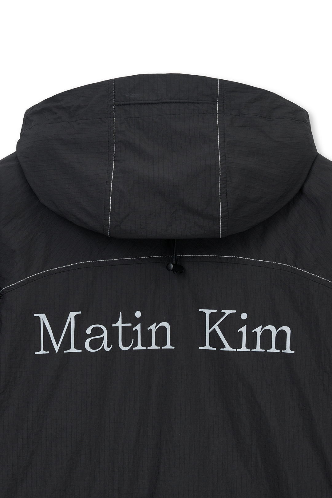 Matin Kim Cropped Back Logo Windbreaker — Black