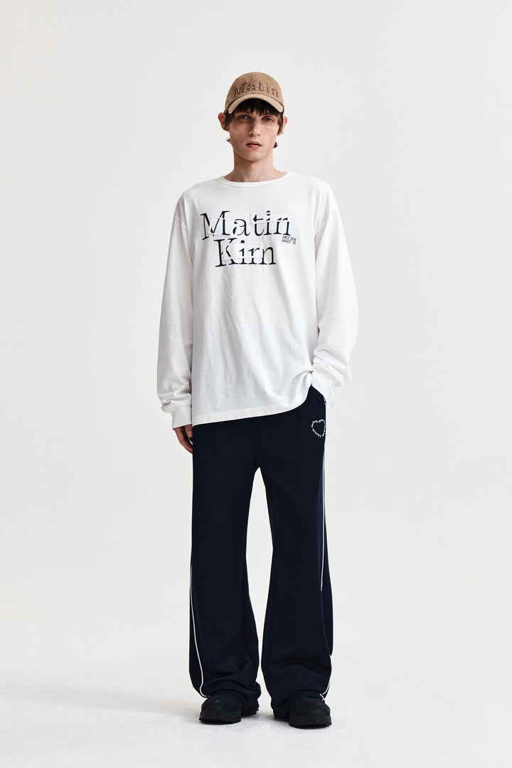 Matin Kim Patch Graphic Long Sleeve Top — White