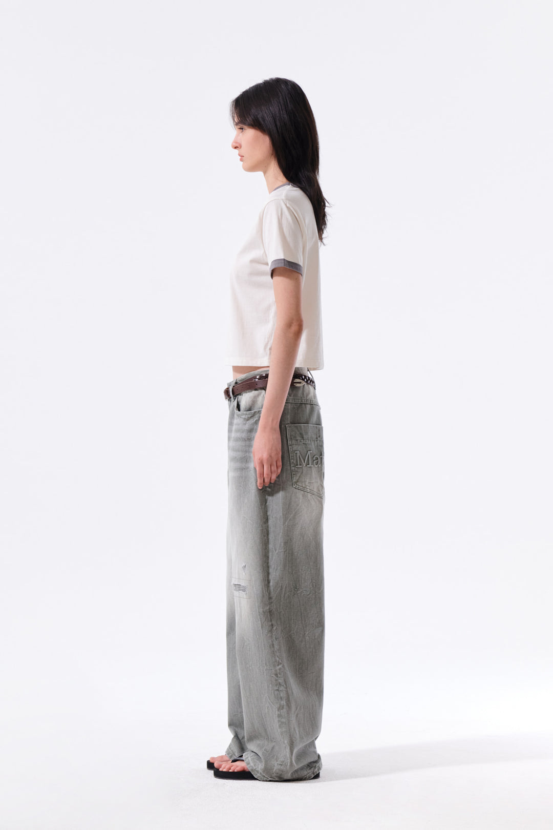 Matin Kim Back Logo Washed Denim Pants — Khaki