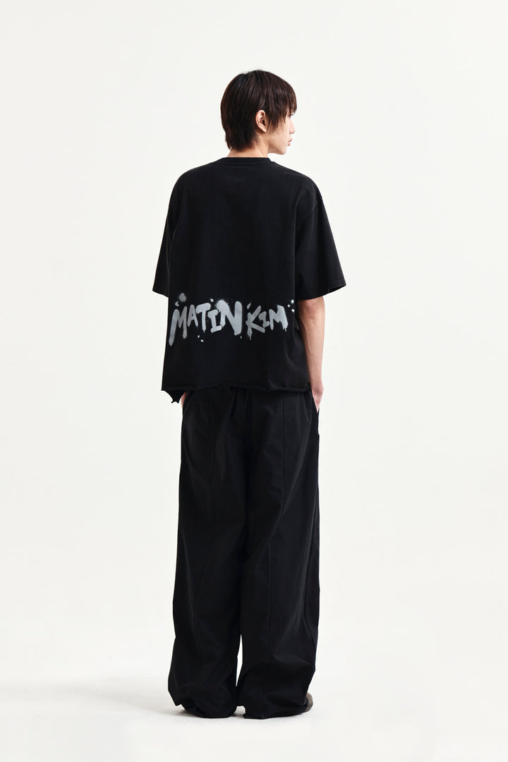 Matin Kim Raw Cut Graffiti Logo Top — Black