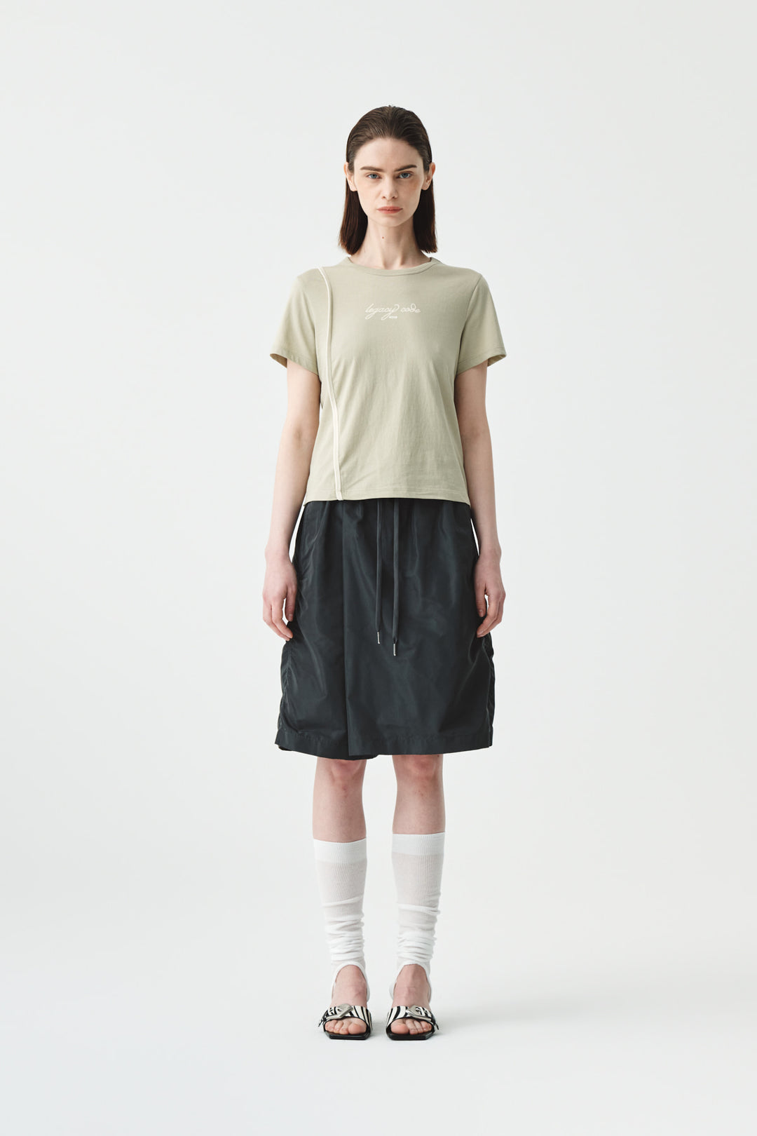 KIMMATIN Back Slit Slim Top in Light — Khaki