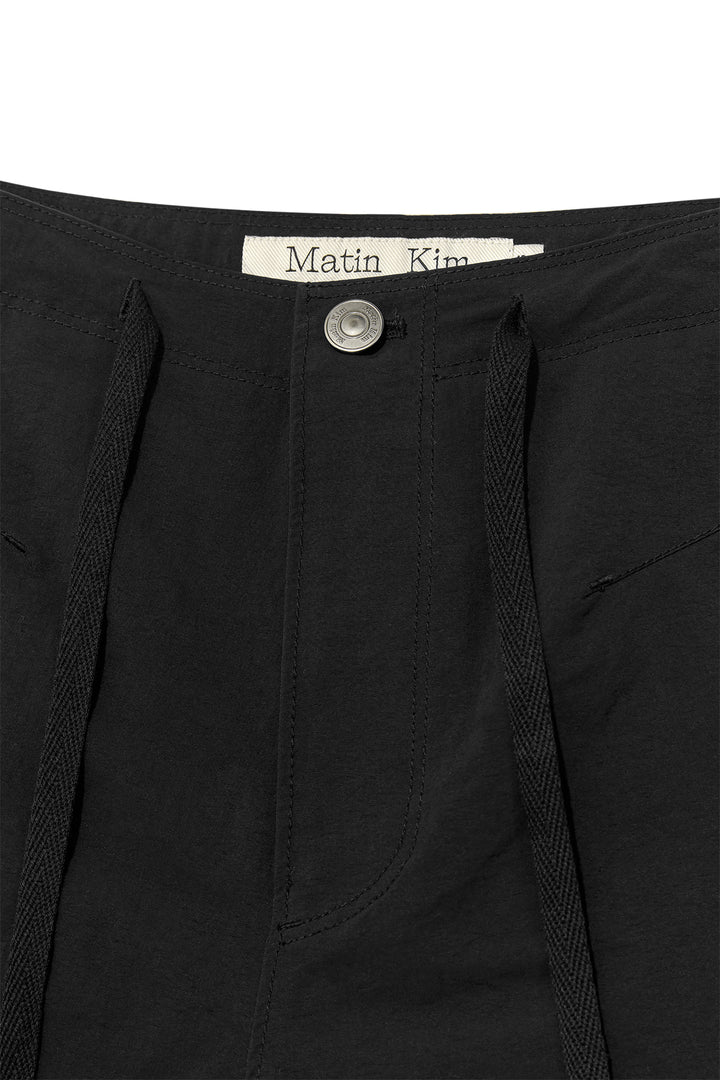 Matin Kim Nylon String Half Pants — Black