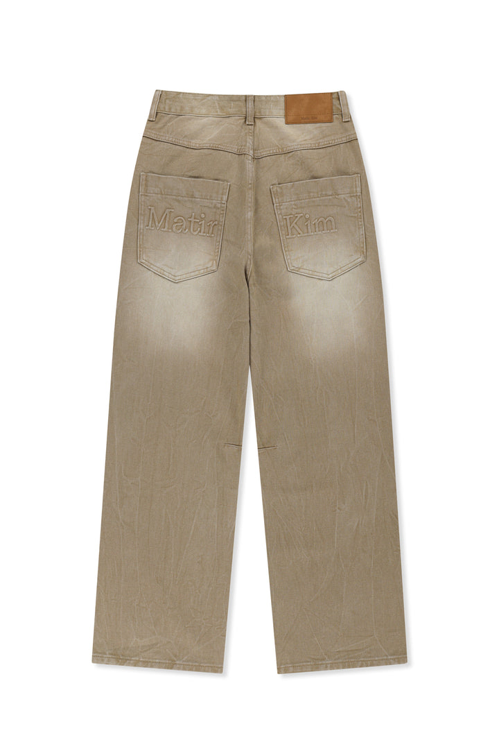 Matin Kim Back Logo Washed Denim Pants — Beige