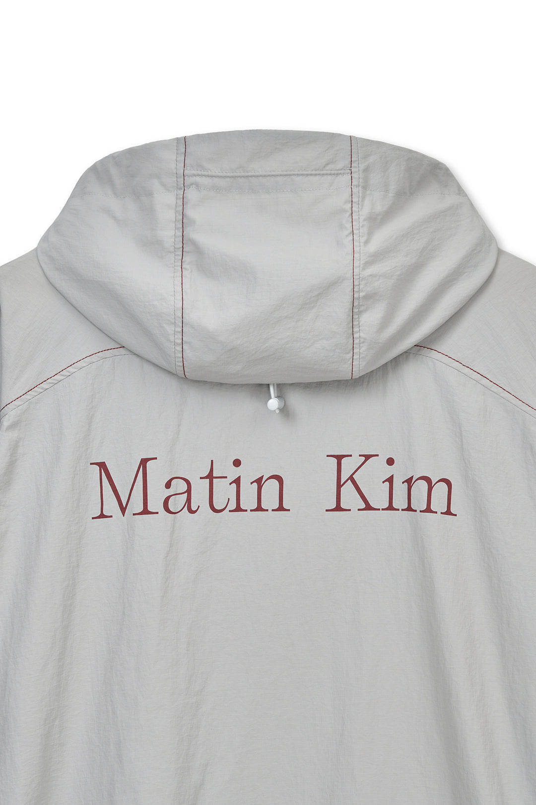 Matin Kim Back Logo Windbreaker — Light — Beige