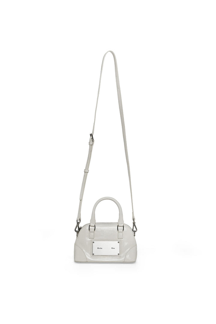 Matin Kim Curve Zip Mini Bag — Light Grey