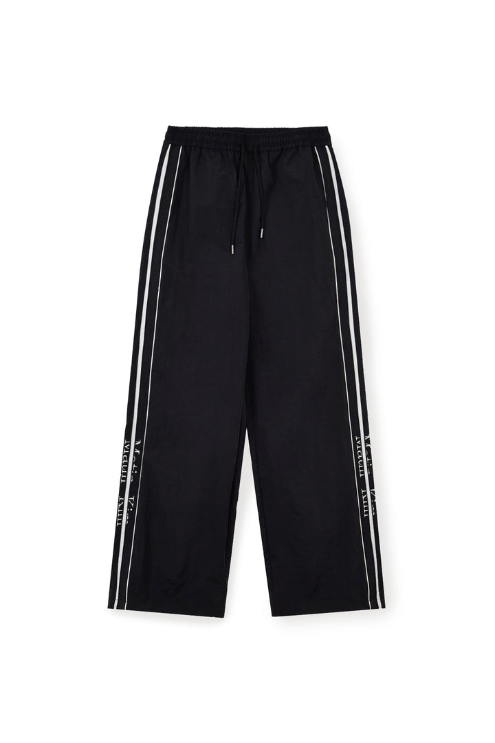 Matin Kim Side Logo Wide Track Pants — Black