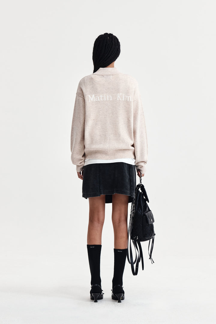 Matin Kim Back Logo Half Knit Zip Pullover — Beige
