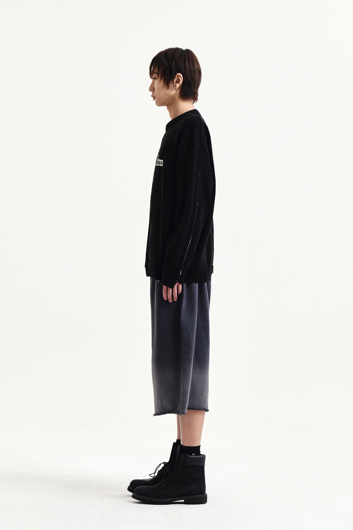Matin Kim Asymmetric Logo Knit Pullover — Black