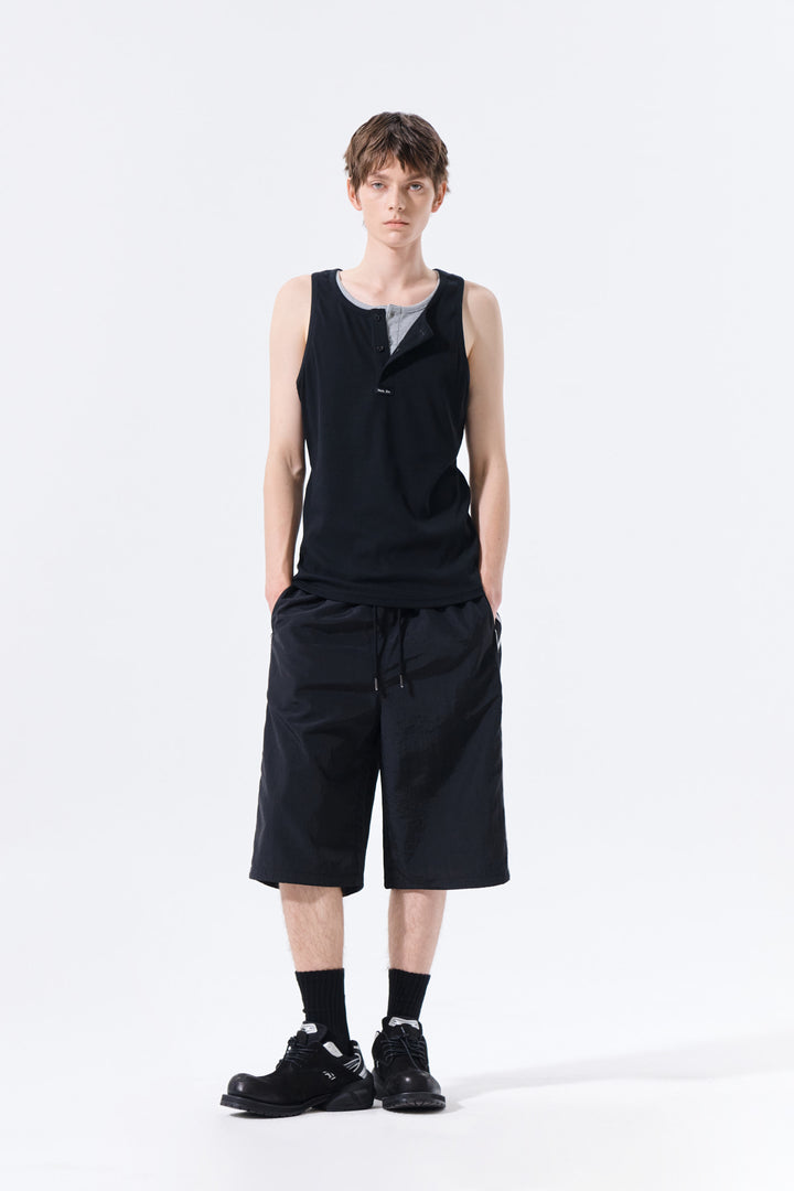 Matin Kim Side Logo Bermuda Track Pants — Black