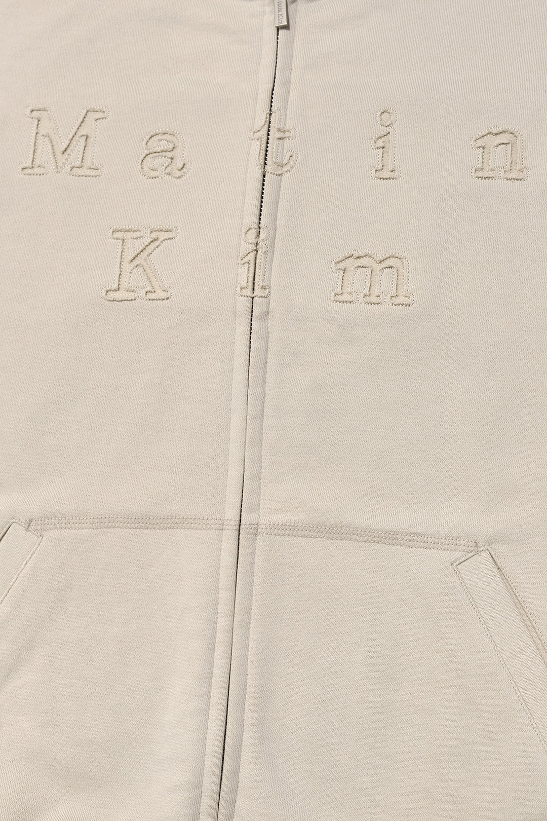 Matin Kim Appliqué Cutout Logo Zip Hoodie — Beige