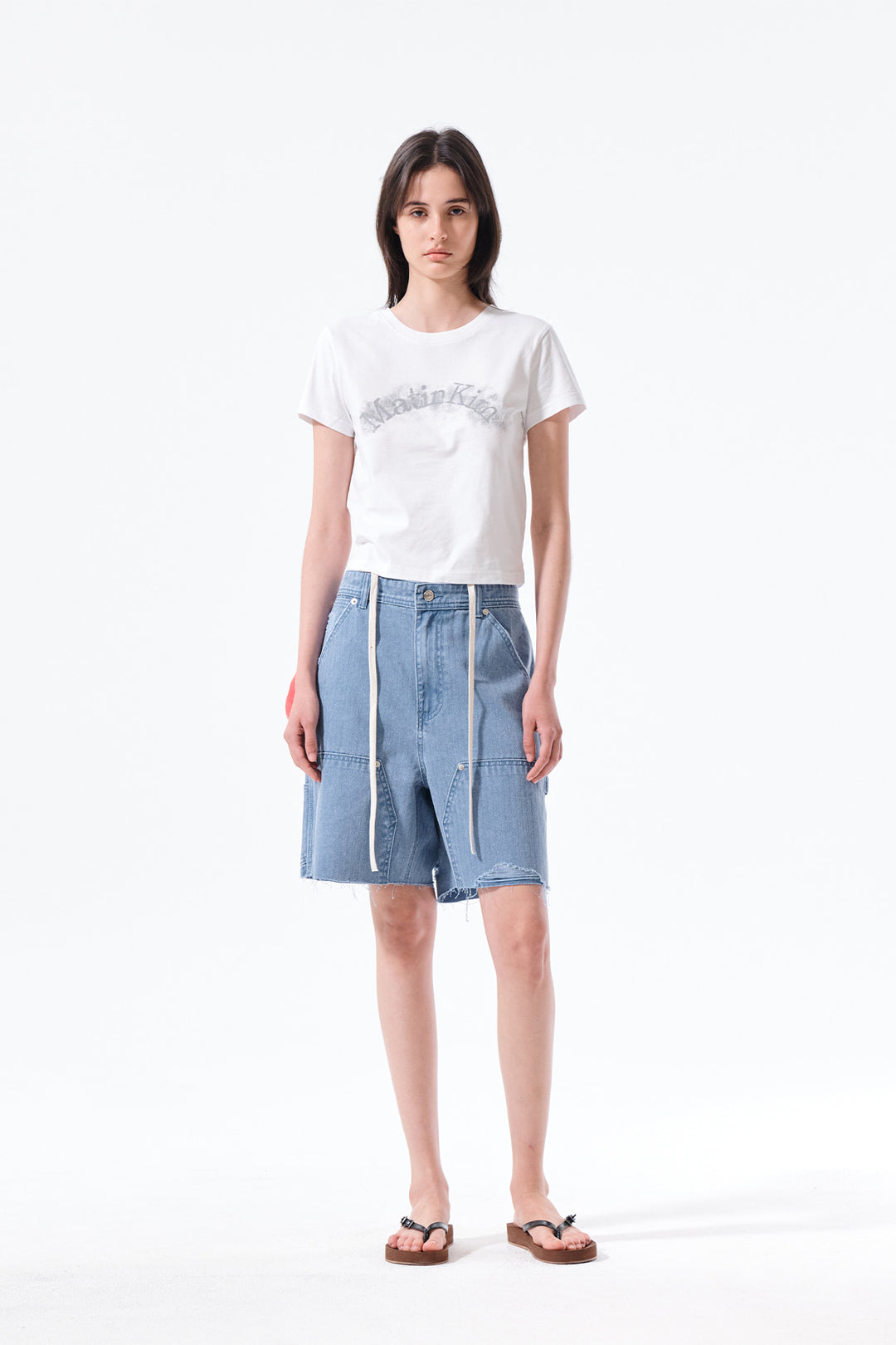 Matin Kim Herringbone Raw Cut Denim Shorts — Light Blue