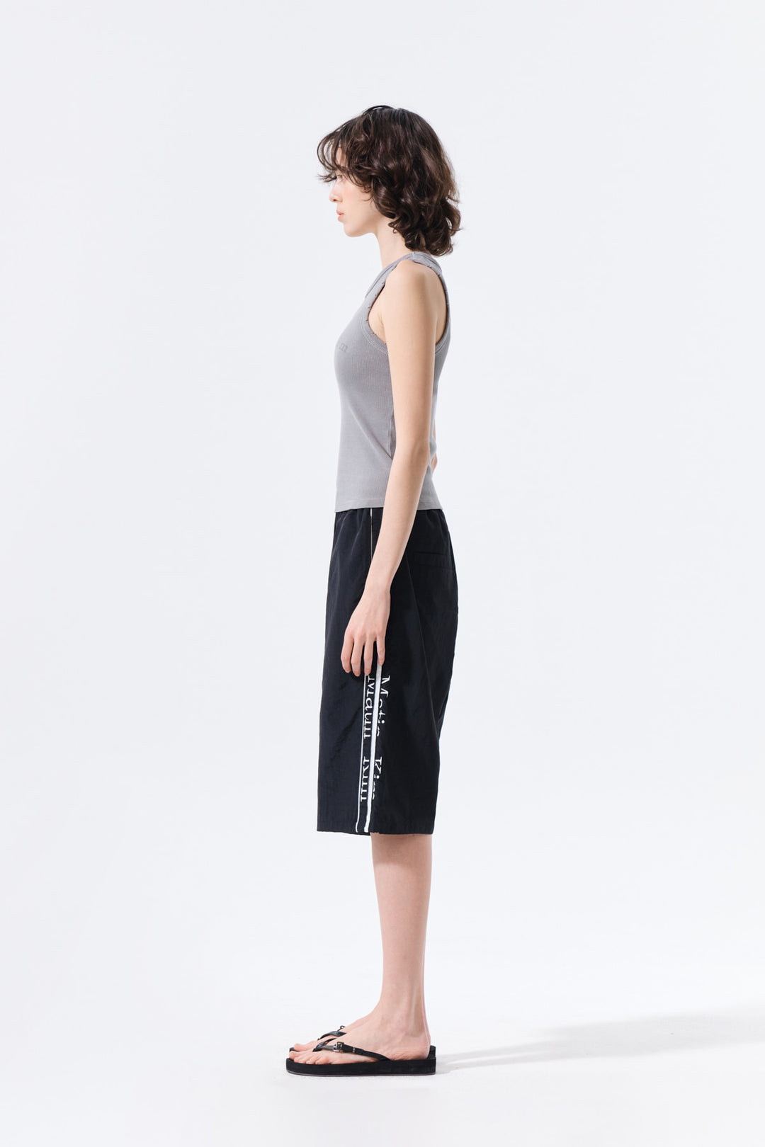 Matin Kim Side Logo Bermuda Track Pants — Black