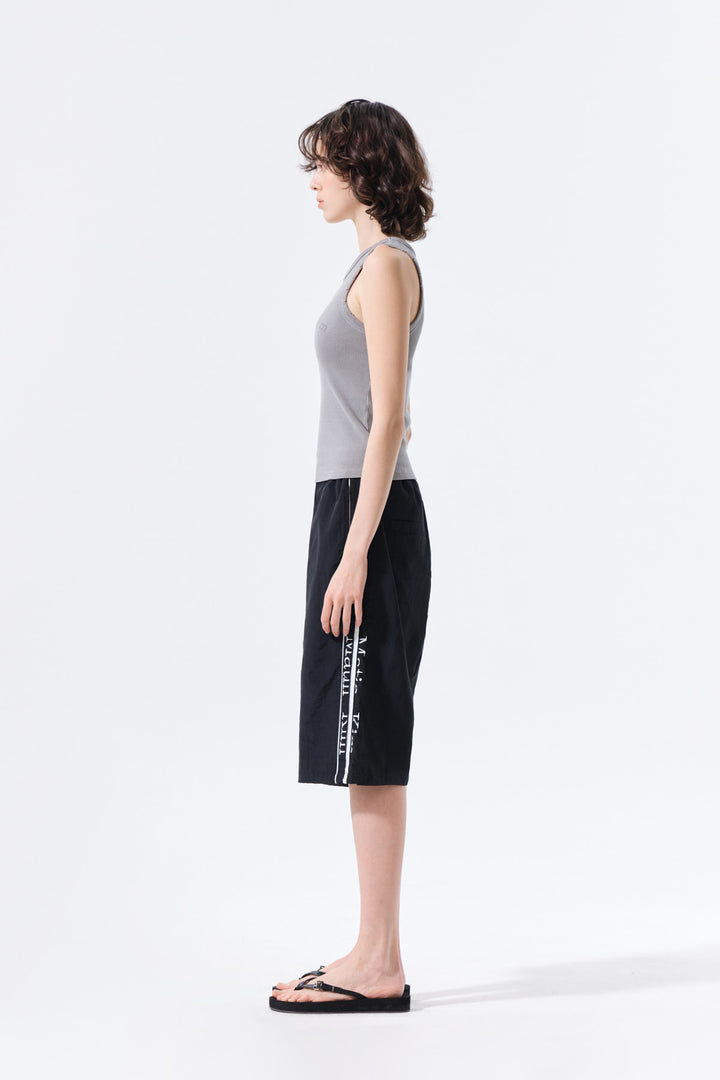 Matin Kim Side Logo Bermuda Track Pants — Black