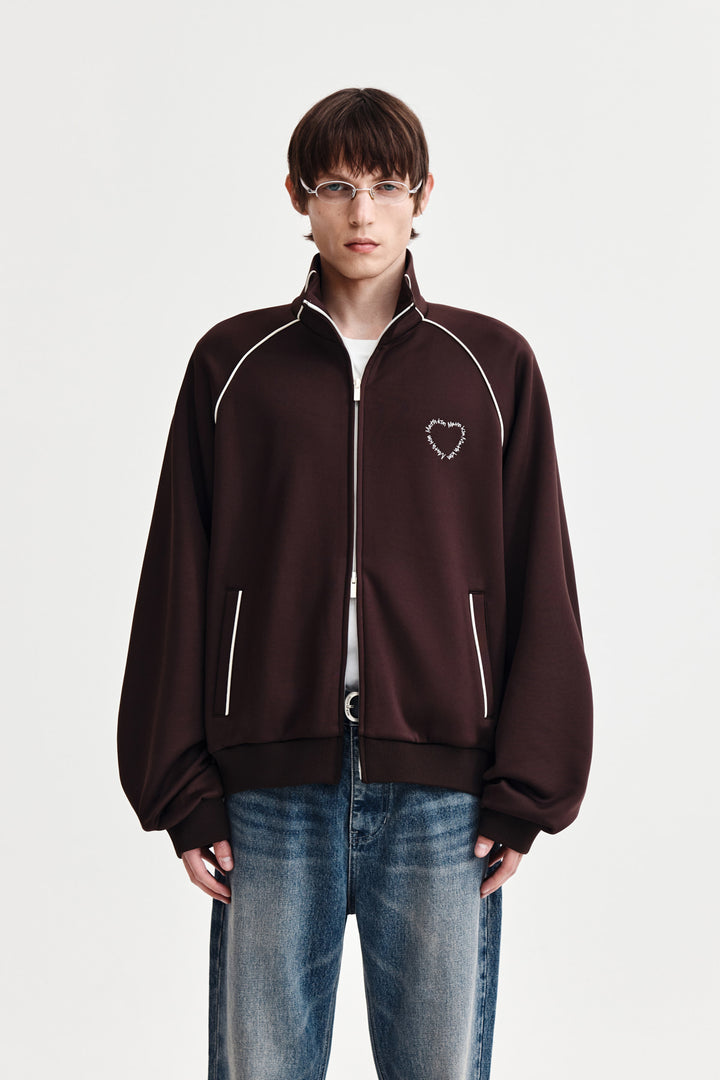 Matin Kim Heart Logo Track Jumper — Brown