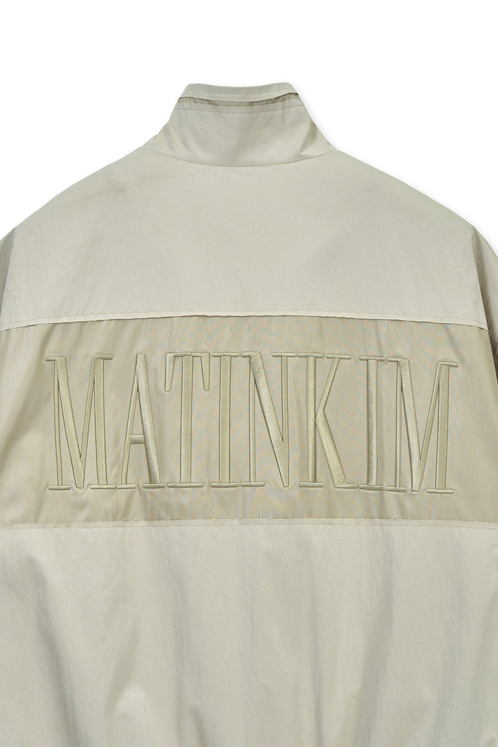 Matin Kim Embroidery Back Logo Jumper — Beige