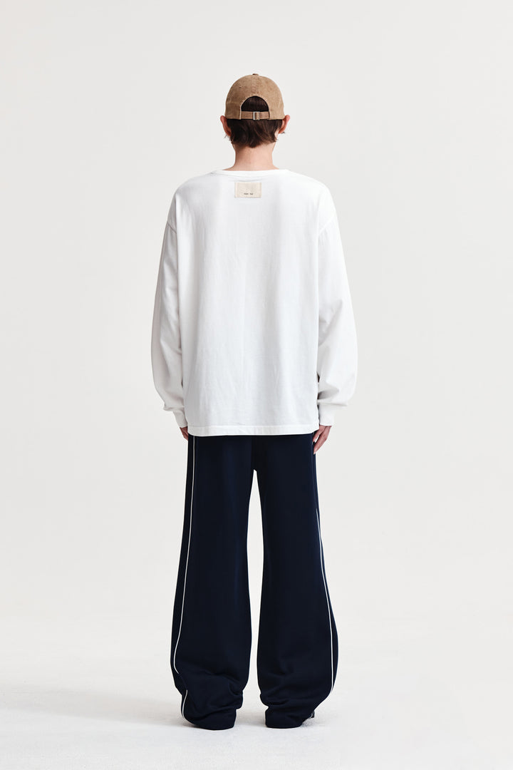 Matin Kim Patch Graphic Long Sleeve Top — White