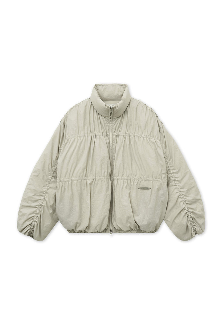 Matin Kim High Neck Shirring Down Jumper — Beige