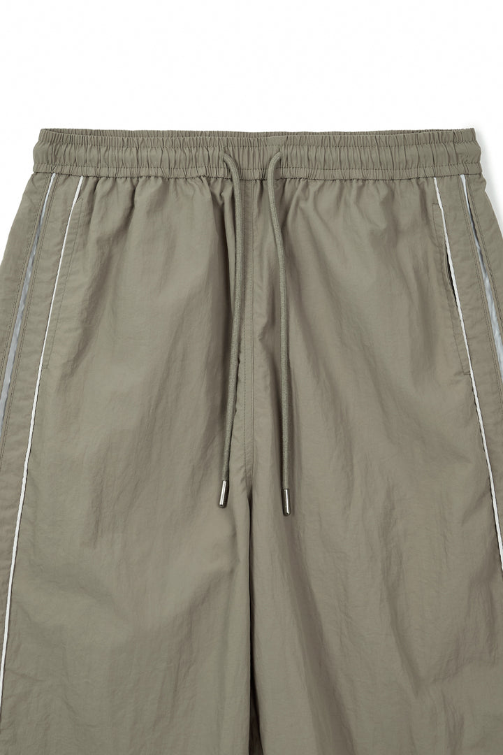 Matin Kim Side Logo Wide Track Pants — Khaki