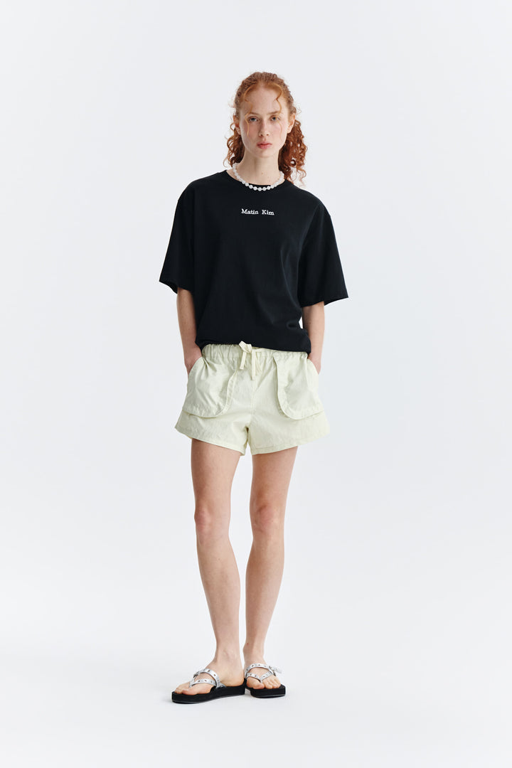 Matin Kim Embroidery Small Logo Oversize Top — Black