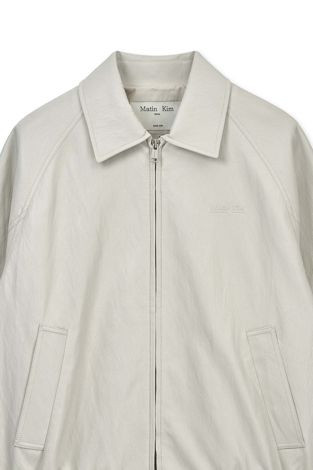 Matin Kim Small Logo Faux Leather Zip-Up — Light Grey