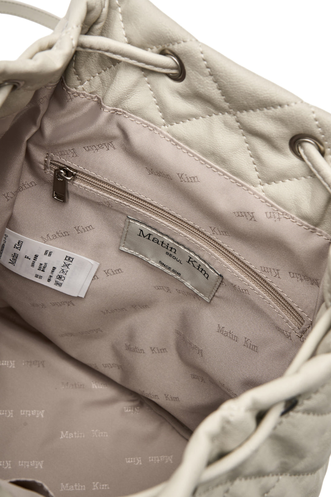 Matin Kim Double Pocket Quilting Backpack — Beige