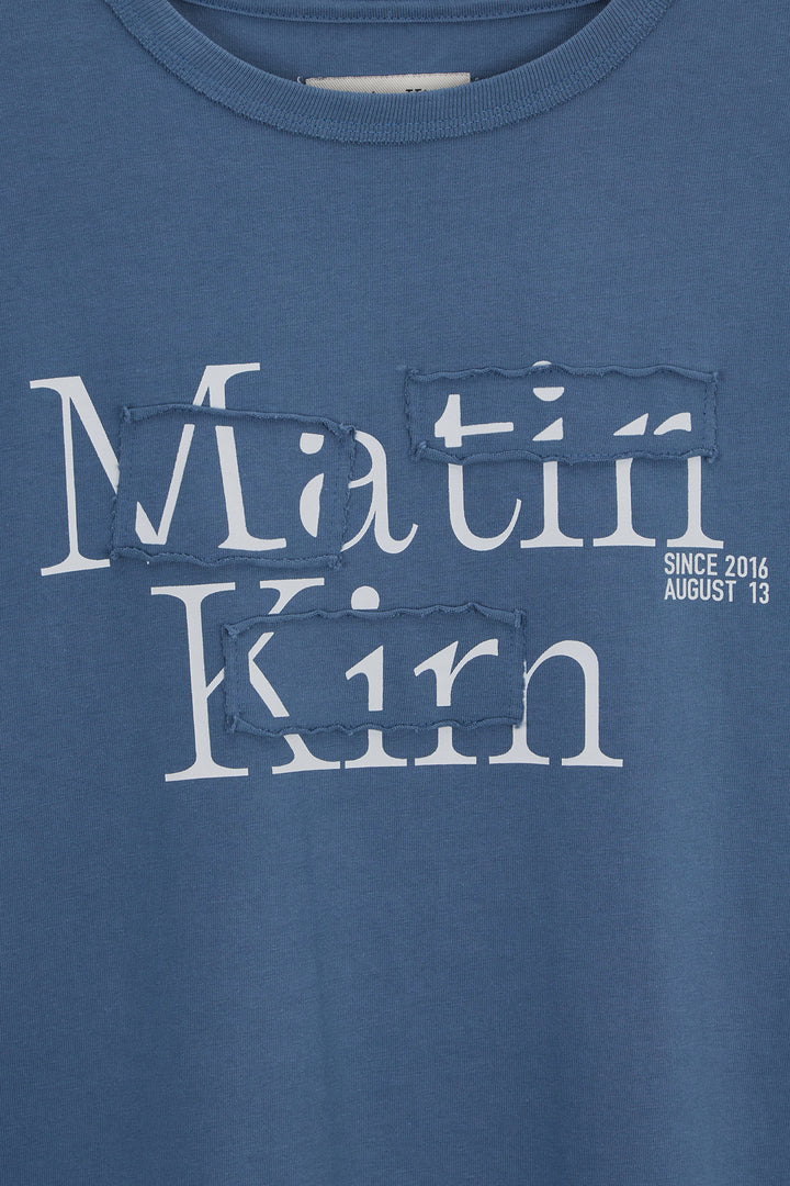 Matin Kim Patch Graphic Long Sleeve Top — Blue