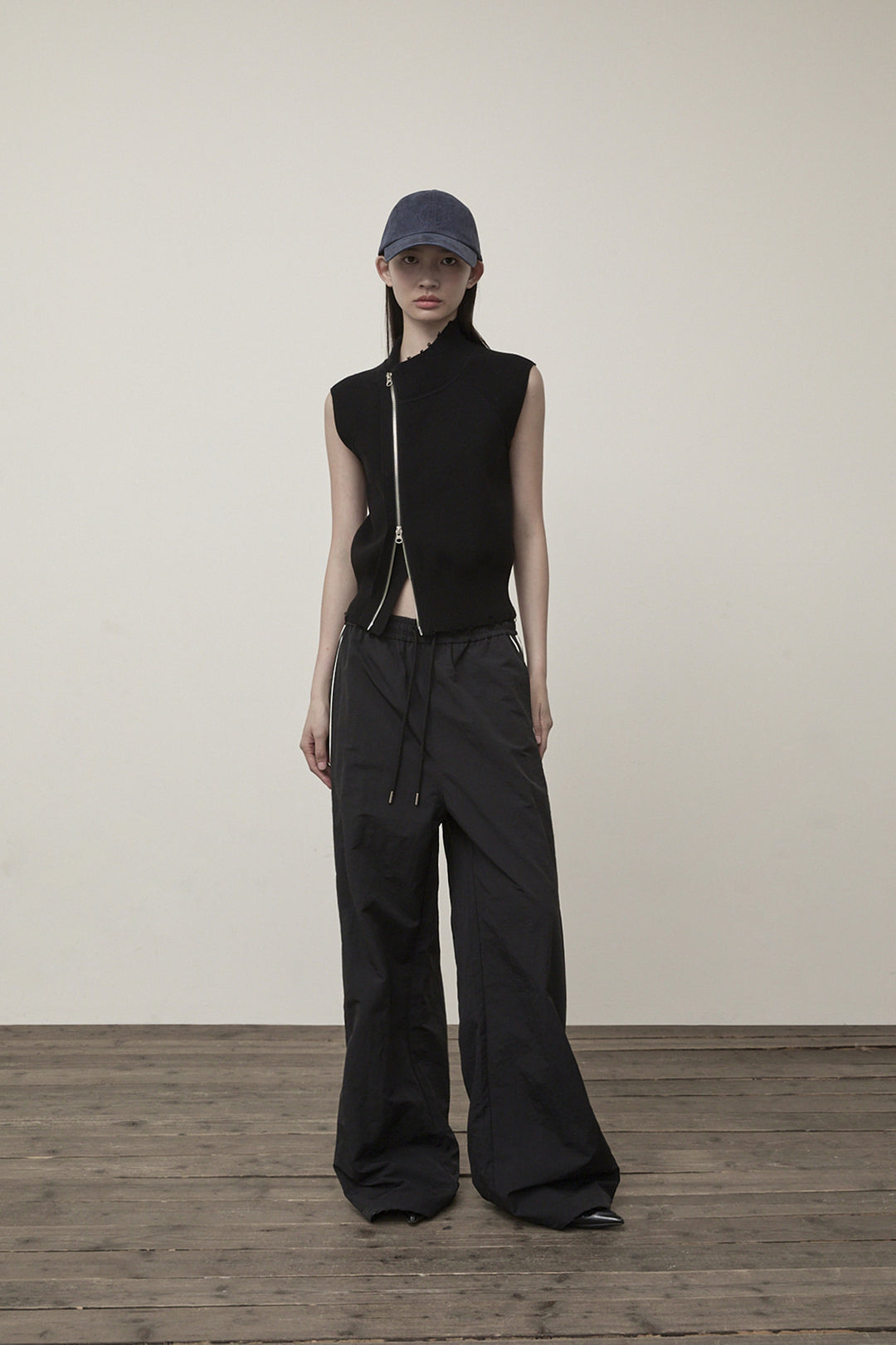 Matin Kim High Neck Logo Knit Zip Vest — Black