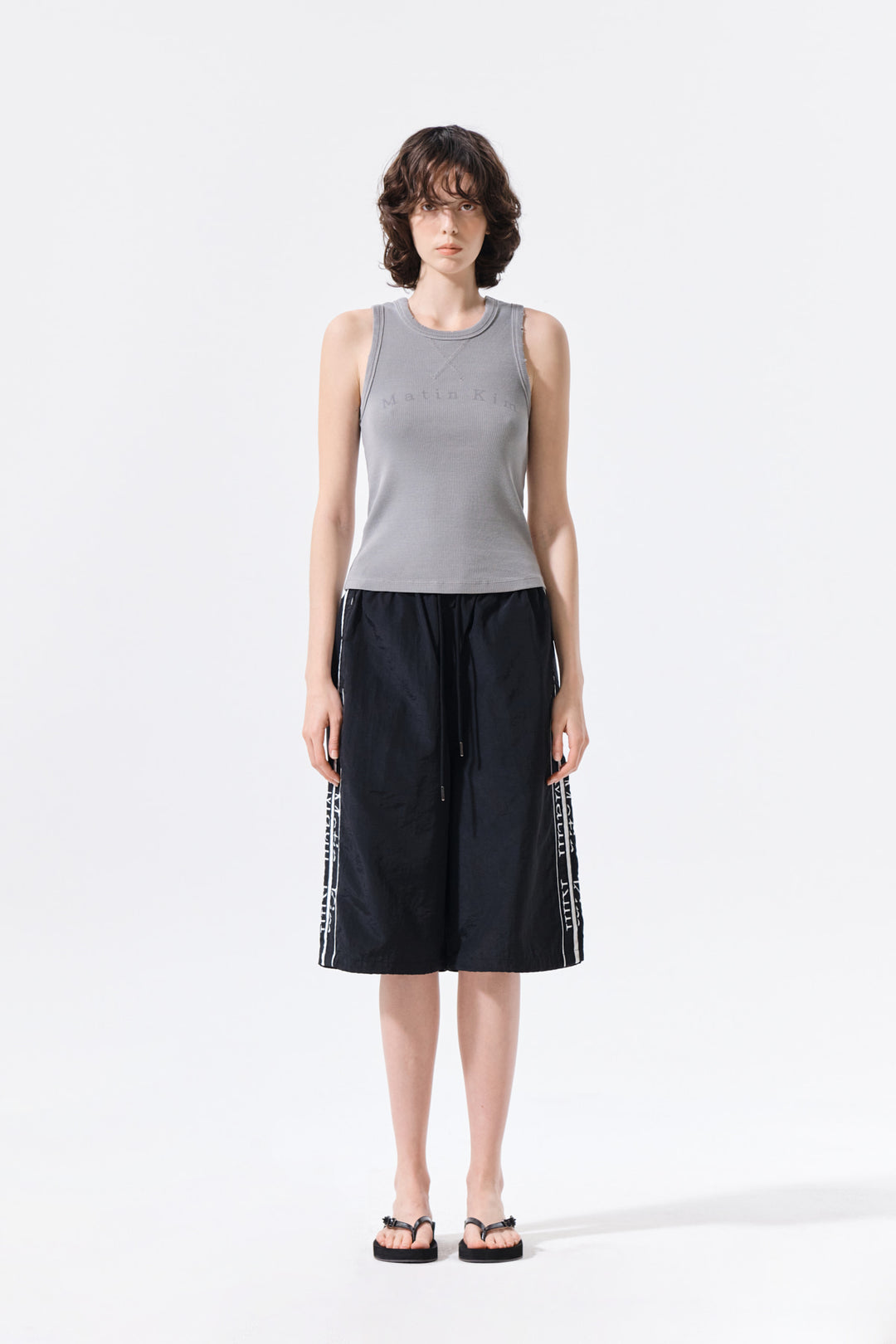 Matin Kim Side Logo Bermuda Track Pants — Black
