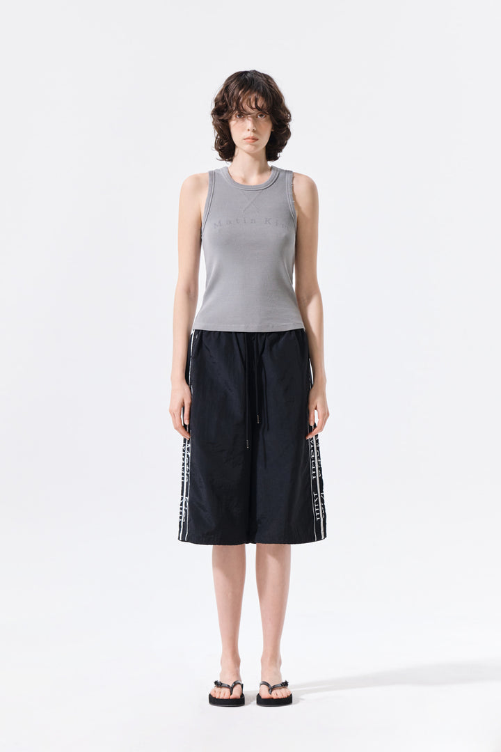 Matin Kim Side Logo Bermuda Track Pants — Black