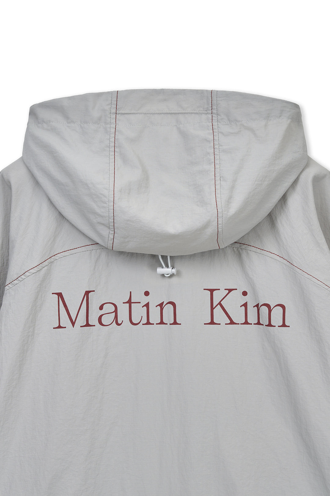 Matin Kim Cropped Back Logo Windbreaker — Beige
