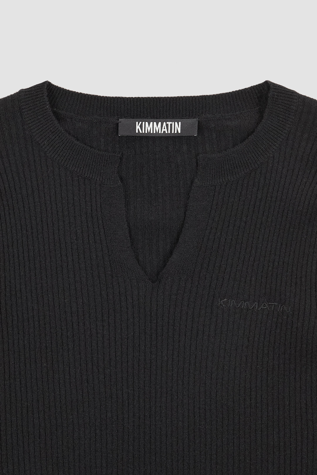 KIMMATIN Slit Point Slim Knit Top — Black