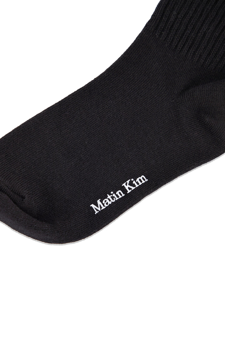 Matin Kim Small Logo Point Ribbed Socks — Black