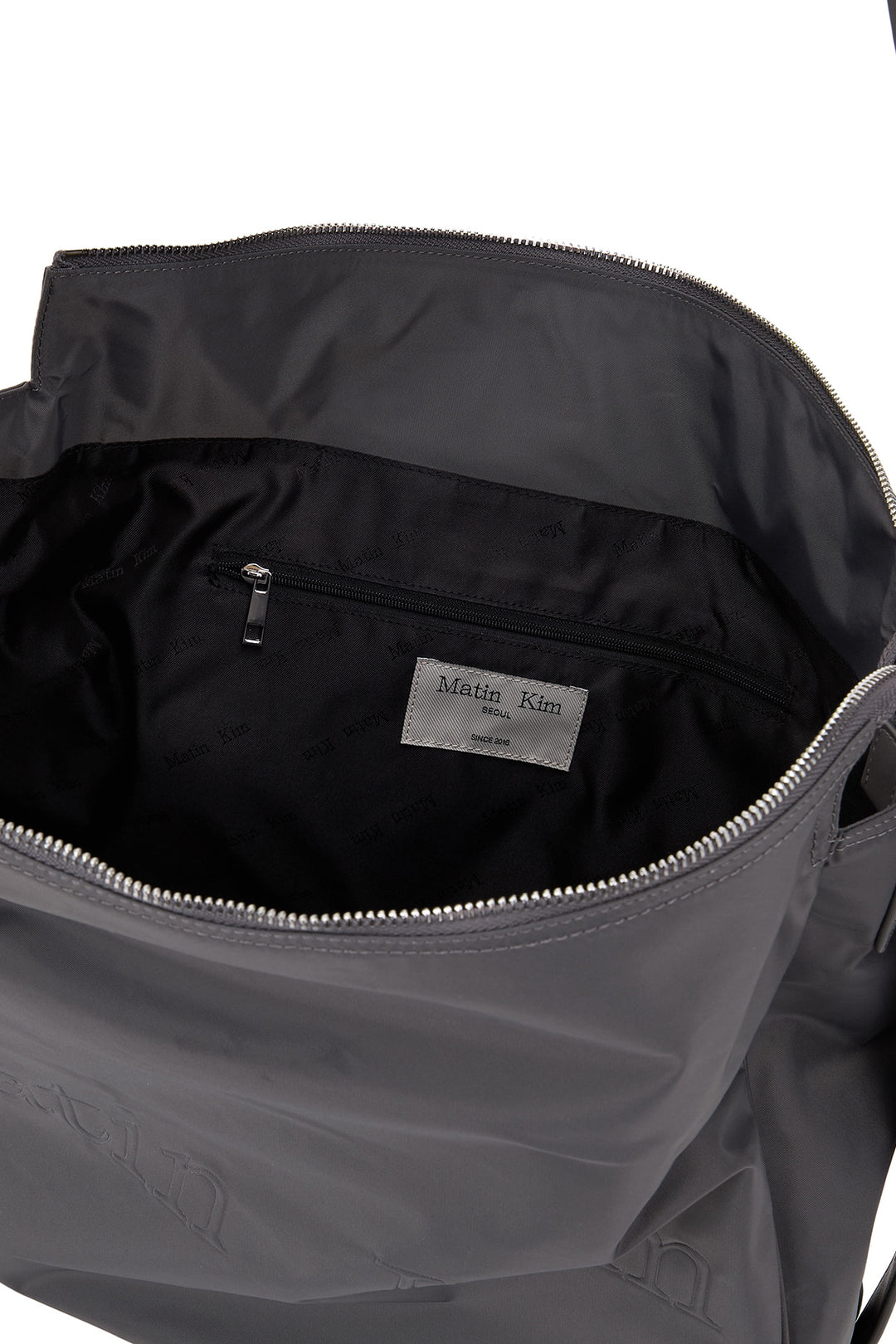 Matin Kim Embossed Logo Nylon Shoulder Bag — Charcoal