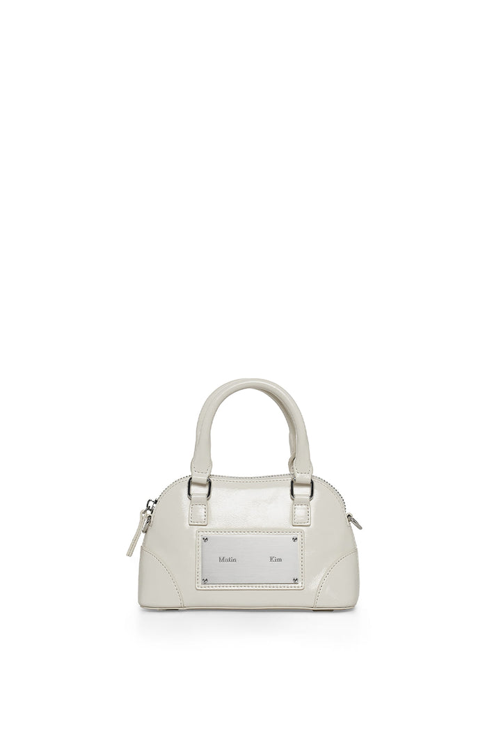 Matin Kim Curve Zip Mini Bag — Light Grey