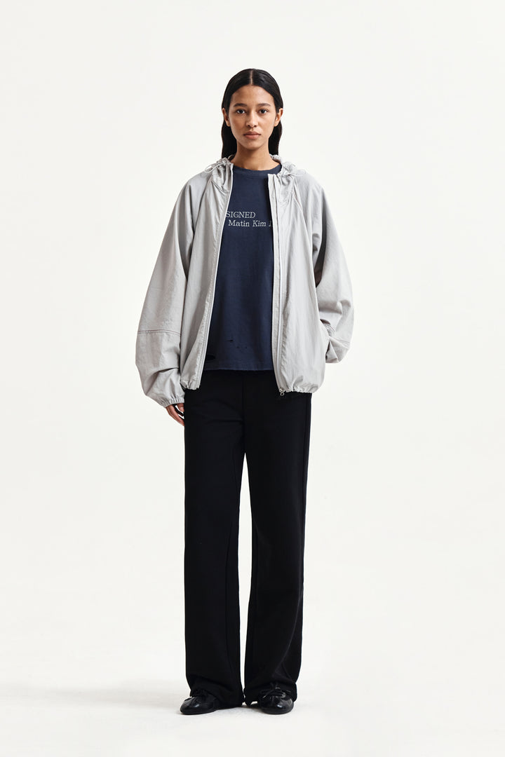 Matin Kim Back Logo Windbreaker — Light — Beige