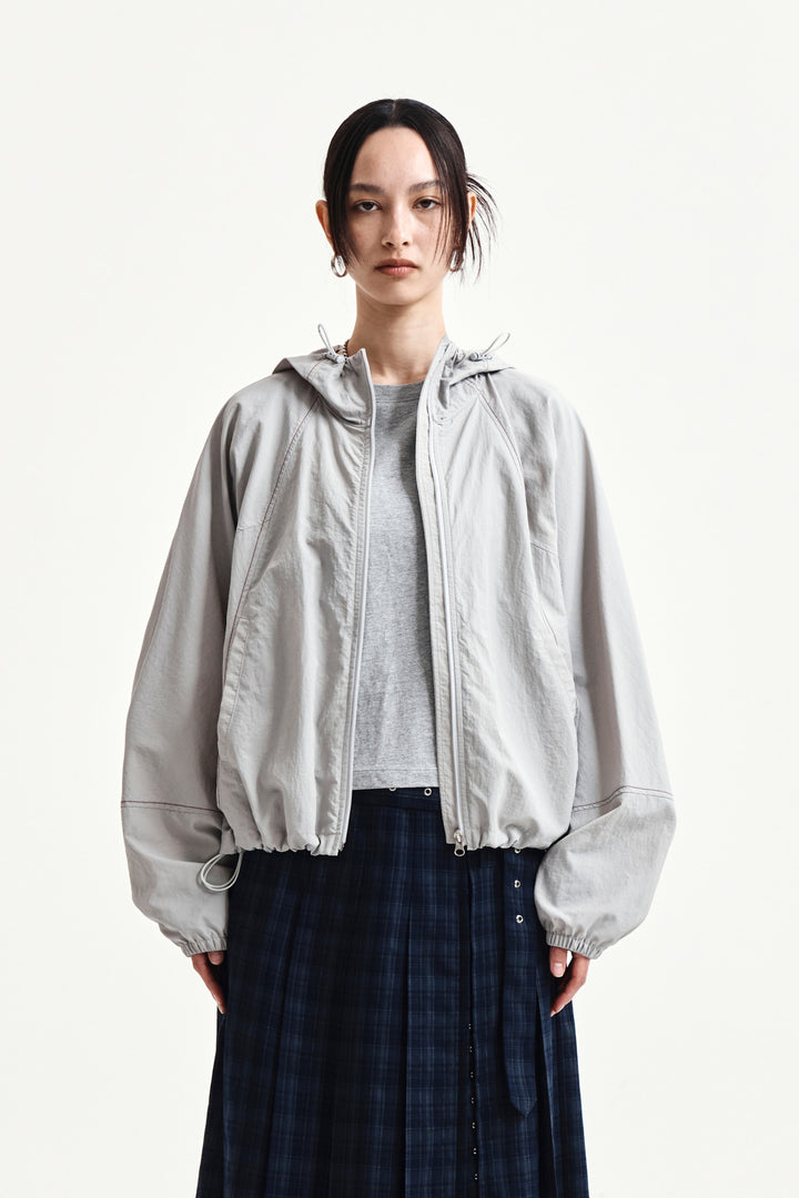 Matin Kim Cropped Back Logo Windbreaker — Beige