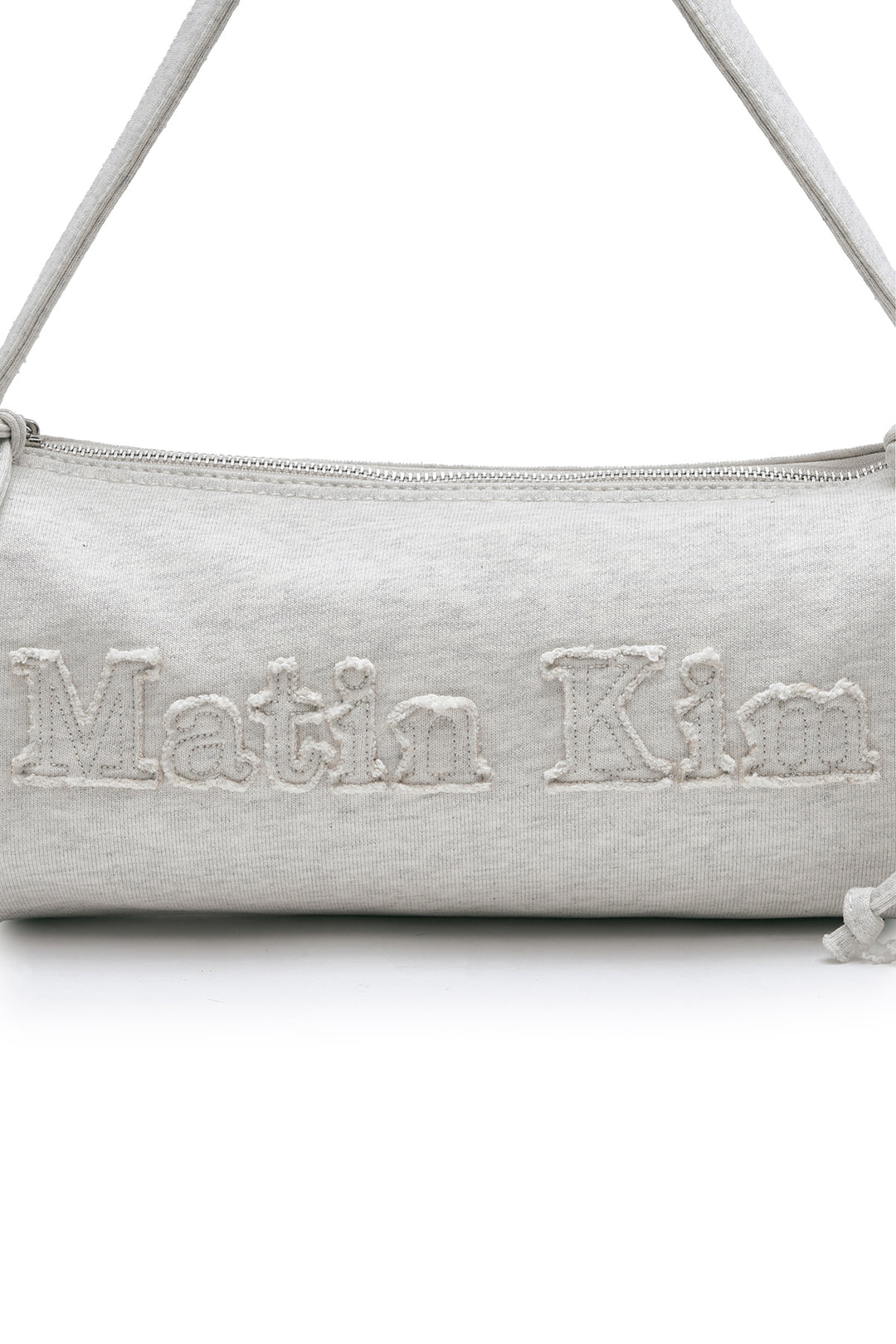Matin Kim Appliqué Logo Jersey Duffle Bag — Beige