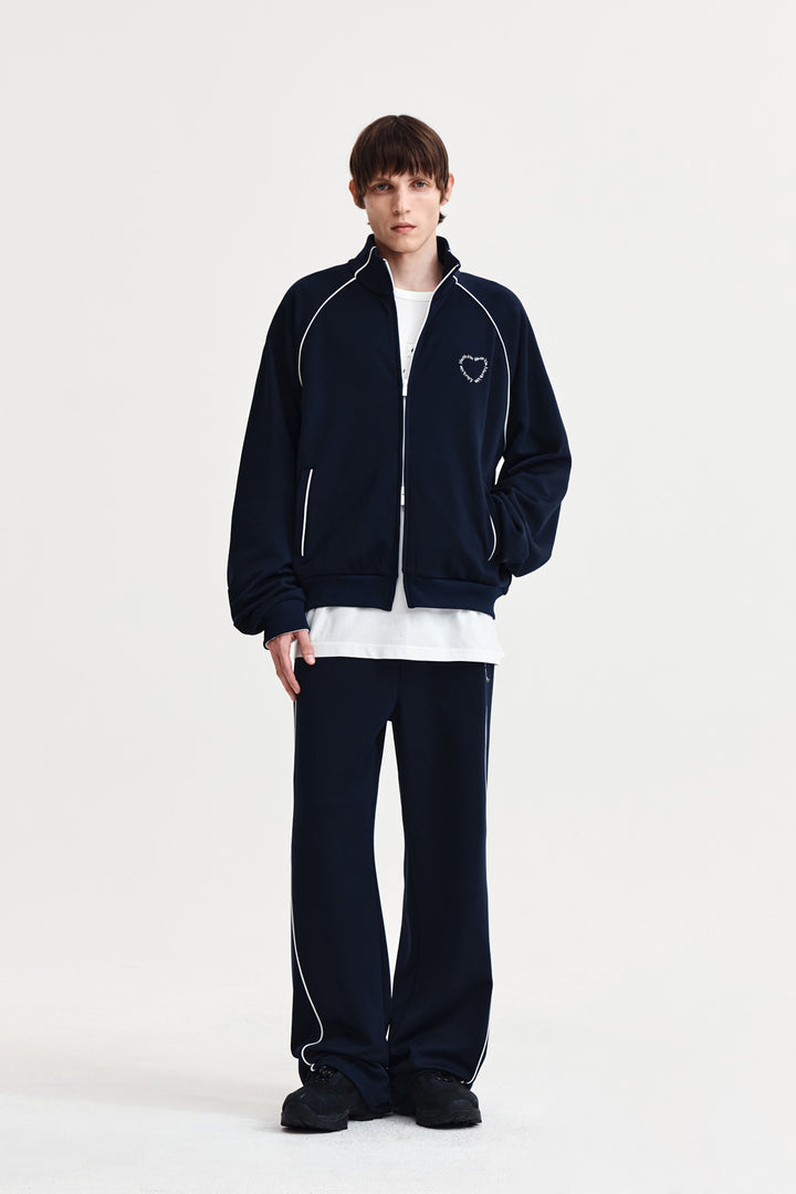 Matin Kim Heart Logo Track Pants — Navy blue